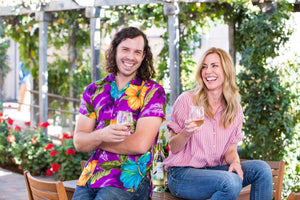 Casey Di Cesear and Heidi Scheid with a glass of Sunny